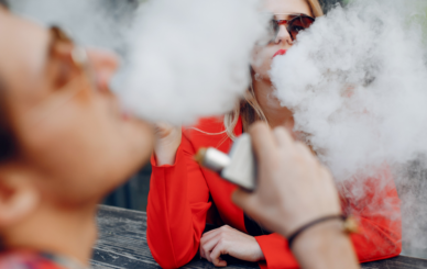 Safety Tips for Vaping Cannabis - a couple blowing smoke from cannabis vape