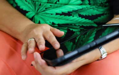 The Best Cannabis Apps: From Strain Finders to Social Networks - Midsection of women holding mobile phone