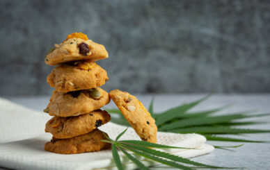 The Long-Lasting Effect of Edibles - Cannabis cookies and cannabis leaves put on a white napkin